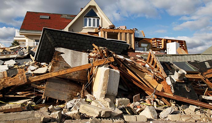 A house severely damaged by a storm A house severely damaged by a storm