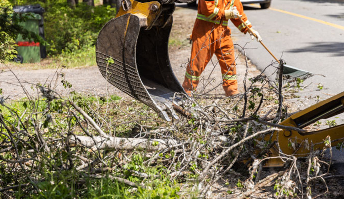 Debris cleanup service using excavator
